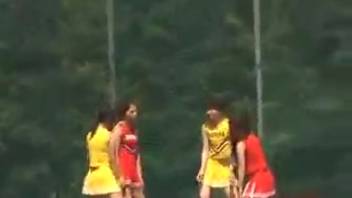 East Asian pom-pom girls defecating outside