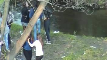 Numerous girls urinating outdoors
